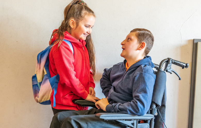 A young carer talking to her brother