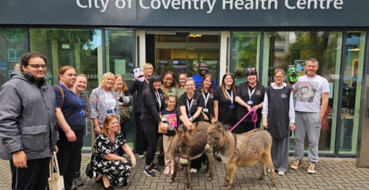 Picture of people standing outside City Of Coventry Health Centre