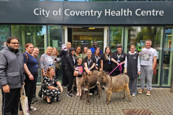 Picture of people standing outside City Of Coventry Health Centre